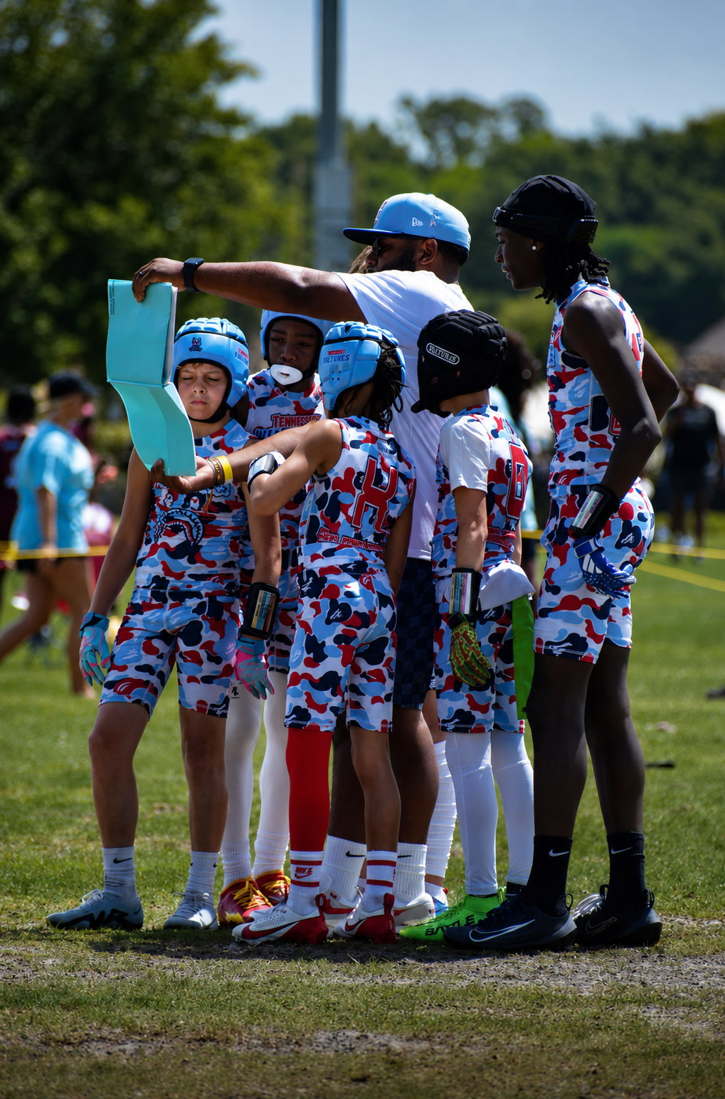 Tennessee Vultures players in a game day huddle